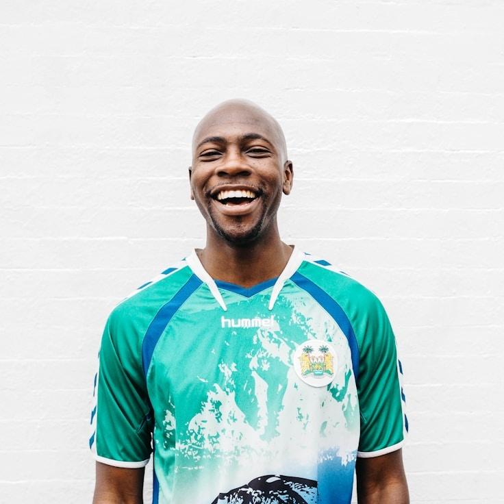 Alex Rivera, Lead Design Curator at Pocket Birch Hill, reviewing corporate floral arrangements